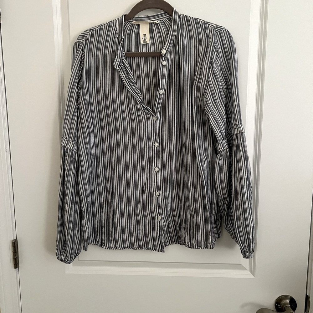 Super cute and cozy striped shirt. Button down